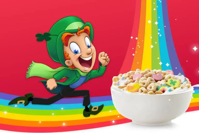 A bowl filled with milk and Lucky Charms™ cereal and marshmallow.