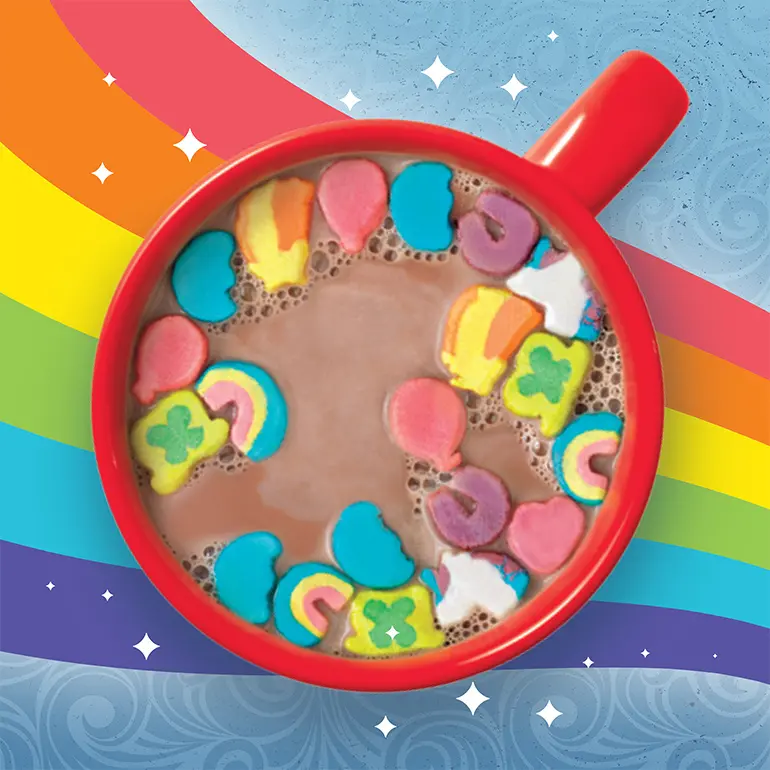 Lucky Charms™ marshmallows floating in cup of Swiss Miss hot cocoa