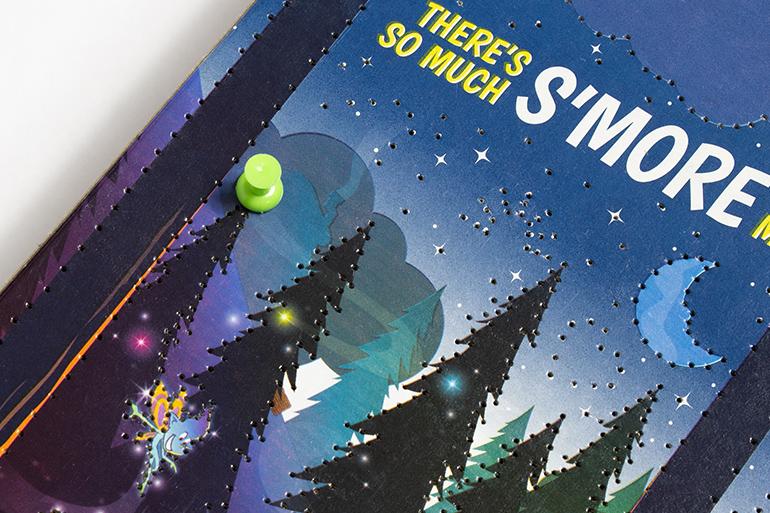 Lucky Charms™ Cereal Box Night Light Step 1 showing a pin used to poke holes in the box.