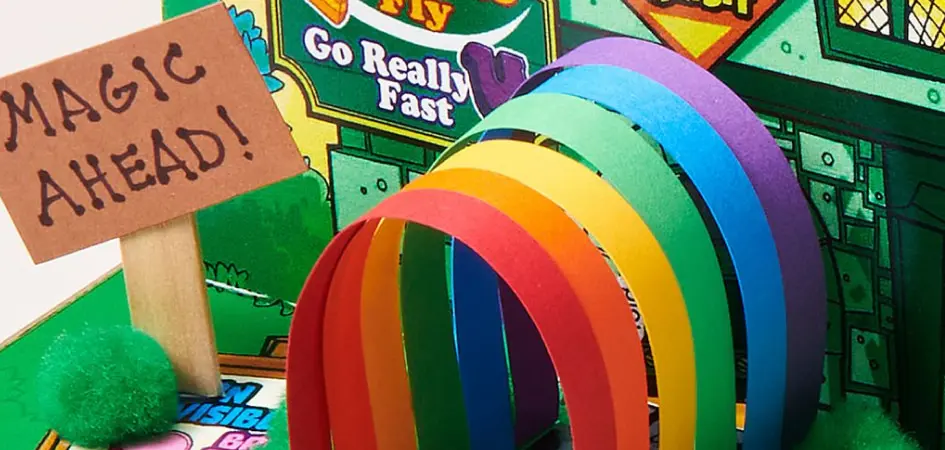 Entrance of a homemade leprechaun trap with a magic ahead sign beside it.